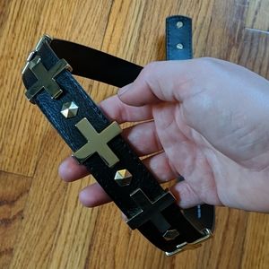 Black and gold cross belt